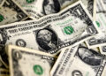Dollar hits one-month low after US yields drop, euro wavers on weak data