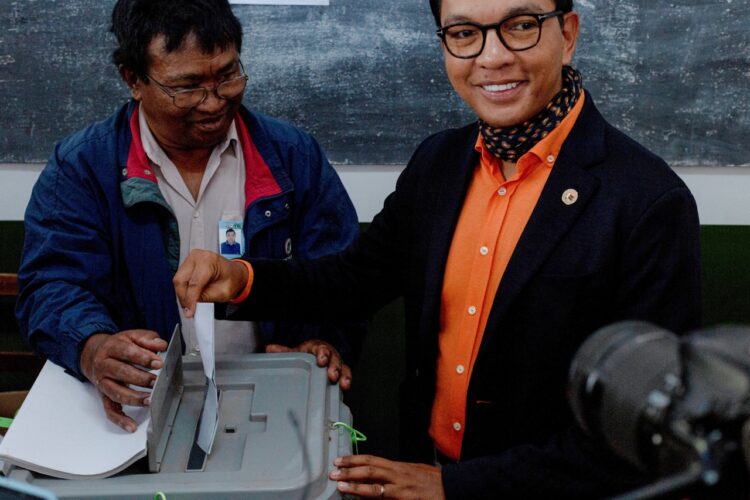 Madagascar's President and a presidential candidate Andry Rajoelina casts his ballot at a polling station during the presidential election in Ambatobe, Antananarivo, Madagascar November 16, 2023.