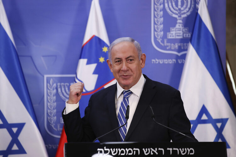 Israeli Prime Minister Benjamin Netanyahu speaks during a meeting with Slovenian Prime Minister Janez Jansa in Jerusalem, Tuesday, Dec. 8, 2020. (Ohad Zwigenberg/Pool via AP)