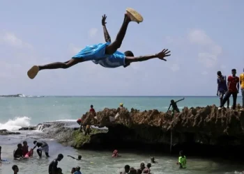 Daring dives and winter walks: Africa’s top shots