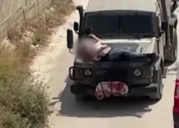 Israeli army strapped wounded Palestinian to jeep