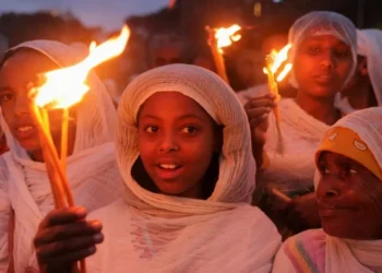 Ethiopia festival fires burn bright despite downpour